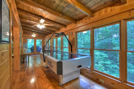 Falling Leaf- Air hockey table with with seating and deck access doors