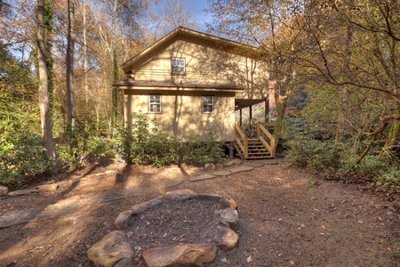 Happy Trout Hideaway- Firepit area with deck access