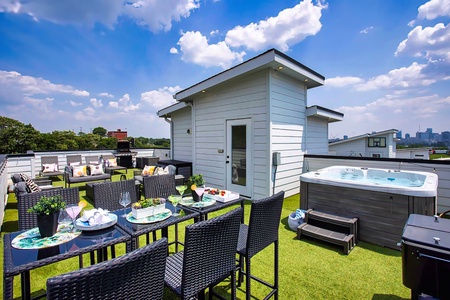 Rooftop Lounge with Cozy Fire Pit!