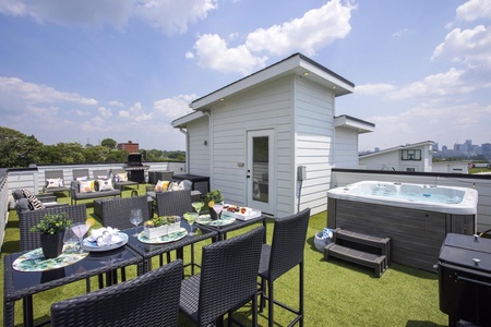 Rooftop Lounge with Cozy Fire Pit!