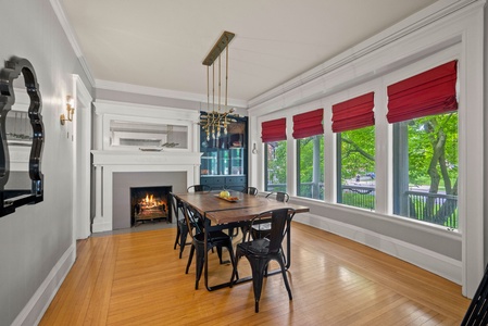 Spacious dining room with faux fireplace