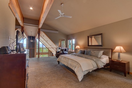 Bedroom with dresser and nightstands: Falcon's Eye View Retreat