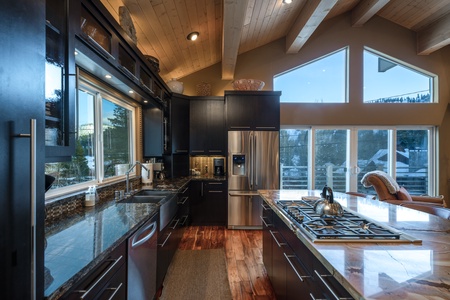 Kitchen with island~ refrigerator and oven: Eagle's Nest Lodge