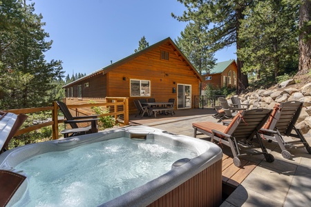 Back patio with hot tub: Mountain Relaxation Haven