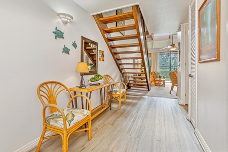 Relax in your bright, airy space with tropical touches and beautiful wooden stairs leading to your private retreat.