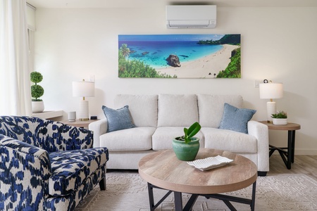Sink into the plush sofa with your favorite book or gather around the coffee table for board games—this bright, airy living room is your perfect retreat after a day of adventure.
