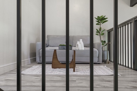 Settle into your modern living space with sleek furnishings and thoughtful design touches that create the perfect atmosphere for relaxation.