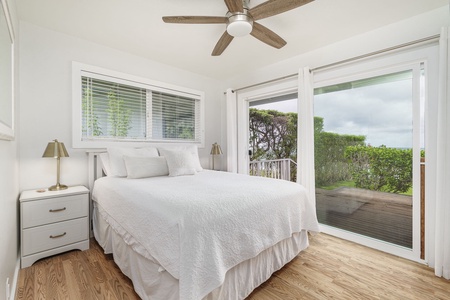 Wake up refreshed in your serene bedroom where natural light filters through and sliding doors open to peaceful garden views.