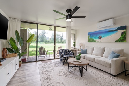 Relax in your bright, modern living space with sliding glass doors opening to your private patio and green lawn. Cool off with air conditioning, unwind on plush seating, and enjoy island-inspired décor.