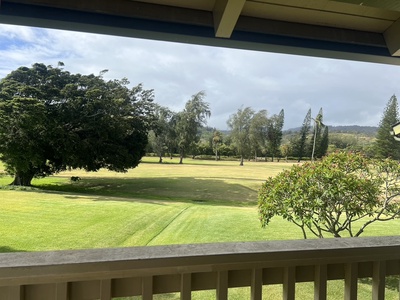 Your private balcony frames lush fairways and rolling mountain foothills, where you'll wake to birdsong and fresh breezes—perfect for morning coffee or sunset cocktails.
