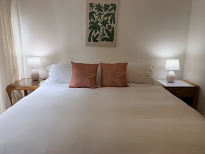 Sink into crisp linens and plush pillows after a day of exploring. Warm bedside lighting and thoughtful décor create a serene retreat where you can truly unwind.