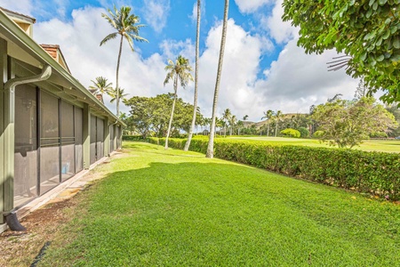 Tropical paradise surrounds this property with swaying palms, manicured greens, and endless blue skies creating the perfect Hawaiian escape.