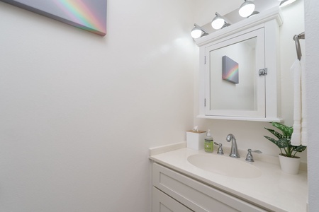 Step into your bright, serene bathroom with crisp white cabinetry and a fresh, modern aesthetic—where every detail is designed for your comfort.