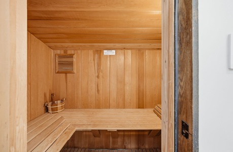 Step into your private sauna and feel the warmth envelop you. The natural wood invites you to unwind, breathe deeply, and let tension melt away in this peaceful retreat.