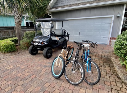 A 4 person golf cart and 3 beach cruiser bikes are INCLUDED!
