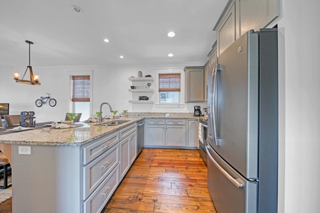 The kitchen features modern finishes and plenty of counterspace!