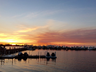 Ride the golf cart to the Marina Bar and Grill for sunset!