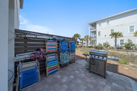 Beach gear wall and grilling area!