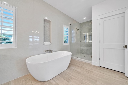 The 2nd floor master bath features dual vanities, walk-in shower and soaking tub!