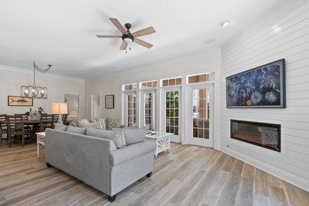 French doors connect the living space to the pool/patio on 2 sides!