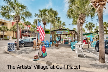 The Artists' Village at Gulf Place showcases local artisans and colorful beach shops amid swaying palms.