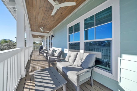 Relax in the shade or follow the back porch steps to pool and beach!