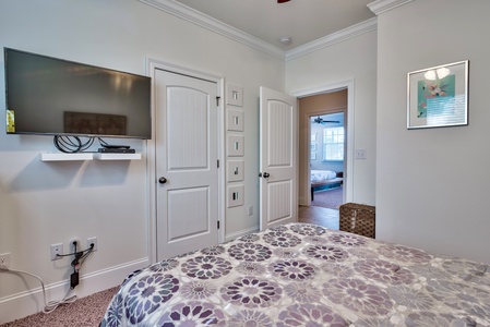 The guest bedroom features a queen platform bed!