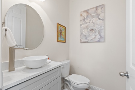 A half-bathroom is located just off the livingroom for your convenience!