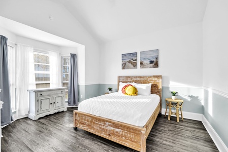 The queen guest room, bright and spacious with neighborhood views.