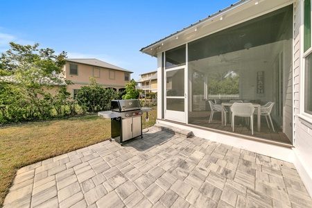 Grilling patio and great back yard!