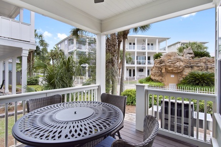 Relax by the back porch fire pit table and wander into the pool!