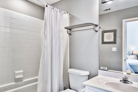 The double-queen private bathroom includes a tub/shower!