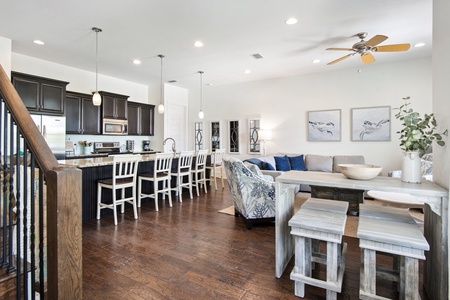 The kitchen-living-dining area offers a great space for family gatherings!