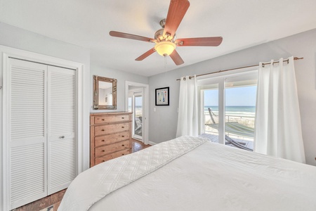 The master bedroom features a king size bed, private bathroom, and Gulf views!