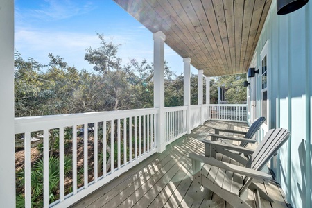 A shaded porch on the ground floor leads out to the pool!