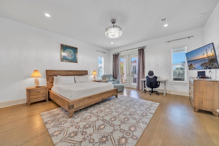 The expansive master suite with king bed, private bath, and balcony!