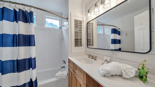 The full-size bathroom includes a tub/shower combo!