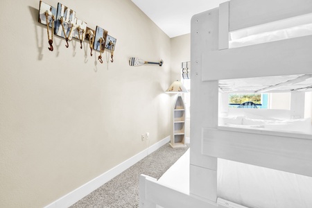 Your family will love this cozy bunk bed room on the 2nd floor, complete with built-in storage and playful nautical touches for memorable bedtimes.