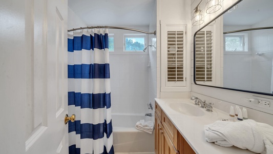 The full-size bathroom includes a tub/shower combo!