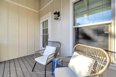 Sink into plush wicker chairs on your private porch, where morning coffee tastes better in the gentle breeze.