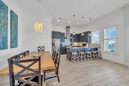 The kitchen features stainless appliances and quartz countertops!