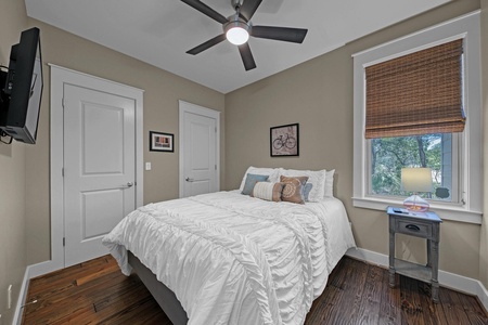 The downstairs bedroom with queen bed and adjacent full bathroom!