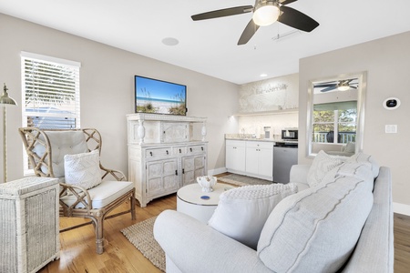 Unwind in this bright, coastal-chic master suite where soft textures and ocean views create your perfect retreat.