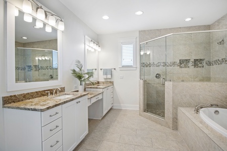 The master bathroom is expansive with walk-in shower, soaking tub, and walk-in closet!