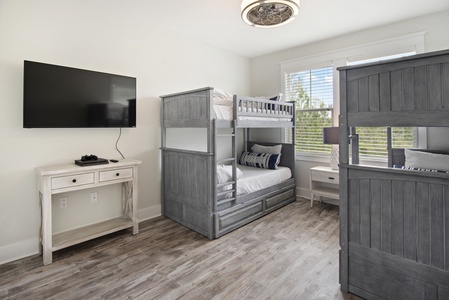 The bunk room includes 4 twins situated in two bunks!