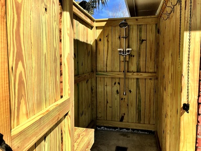 You'll love the outdoor hot shower with privacy enclosure/door!