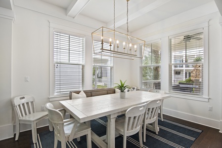 The dining area is light and bright, seats 6 with plenty more seating at the kitchen island!!