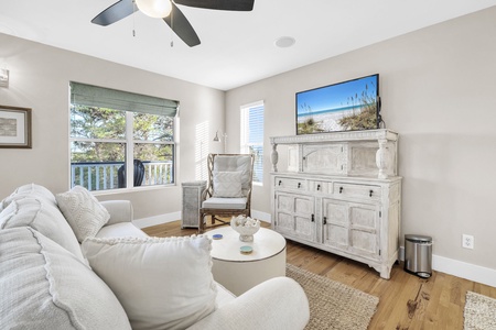 The 3rd floor master suite includes a sofa sleeper, flat screen TV and wet bar.