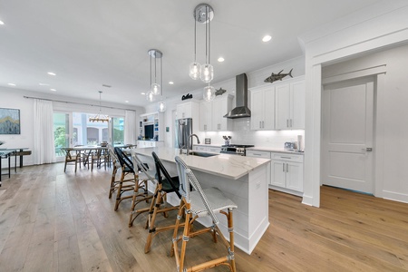 Plenty of seating at dining table and breakfast bar!