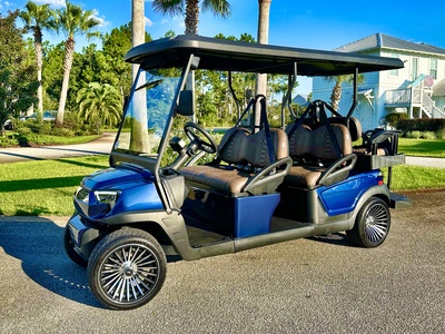 A NEW 6-Passenger Golf Cart is INCLUDED!